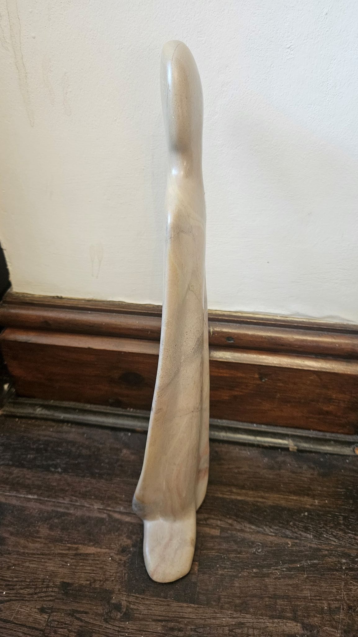 Side view of Mid-Century Modernist Abstract 'Kneeling Figure' Hand-Carved Natural Stone Sculpture