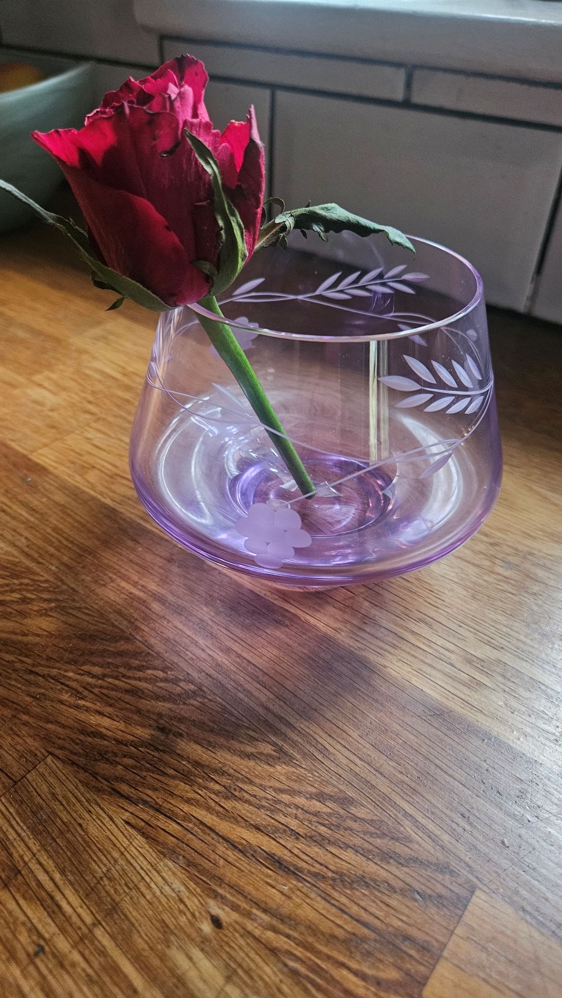 Single rose stem inside Vintage Caithness Etched Glass Grapevine Motif Bowl Vase