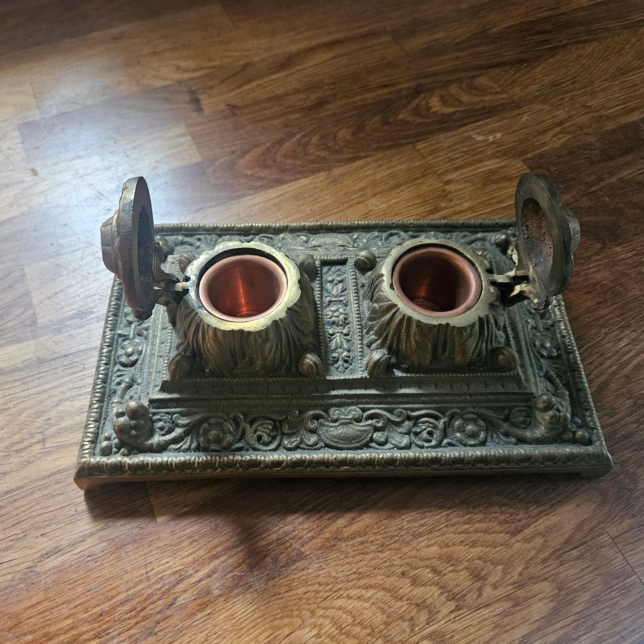 Inside ink wells showing copper inserts on Victorian Style Double Inkwell Desk Stand Ornate 1.63kg Cast Brass