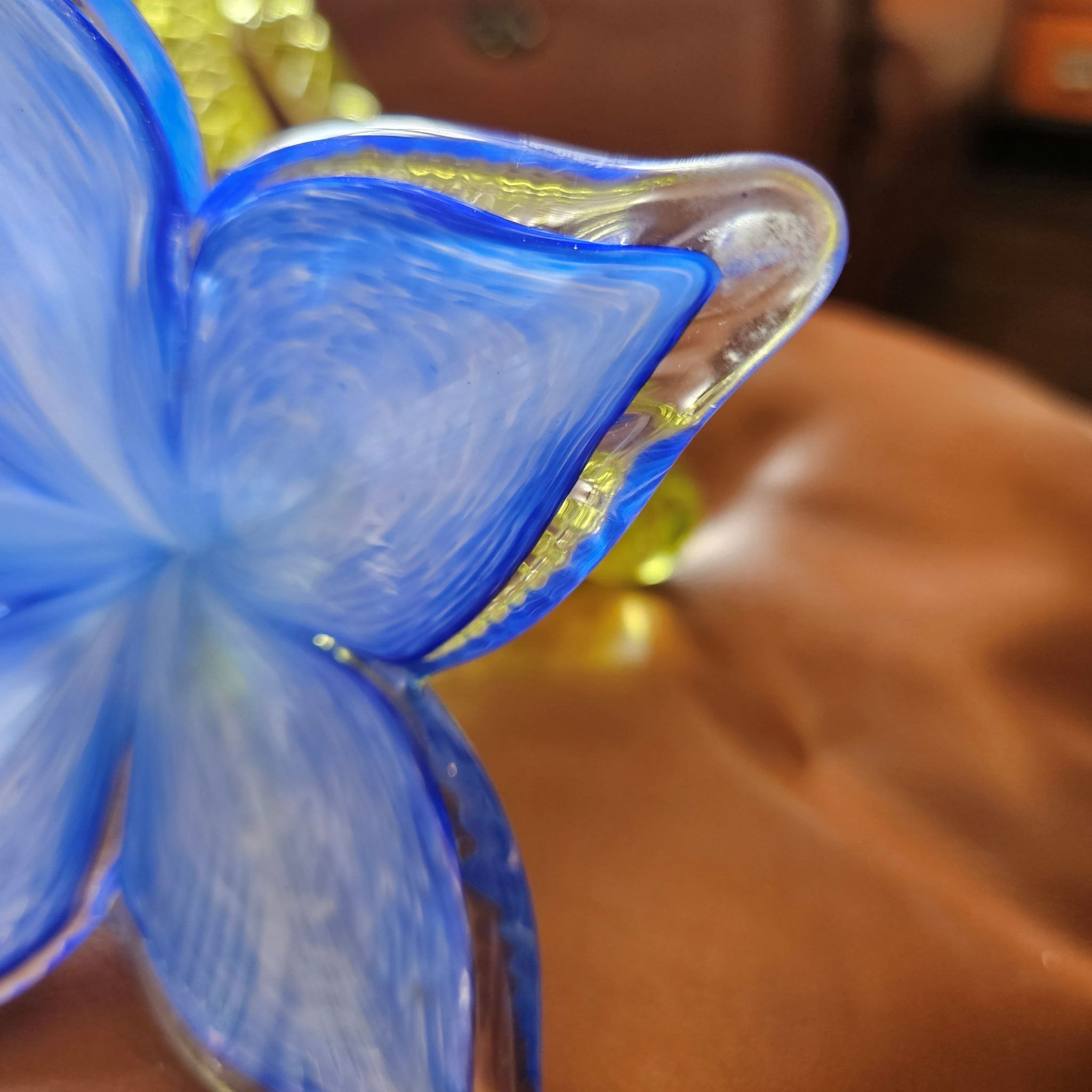 Close up of flea bite on one petal tip on Vintage Murano Style Art Glass Flower Sculpture Zanfirico Filigree Loop Stem