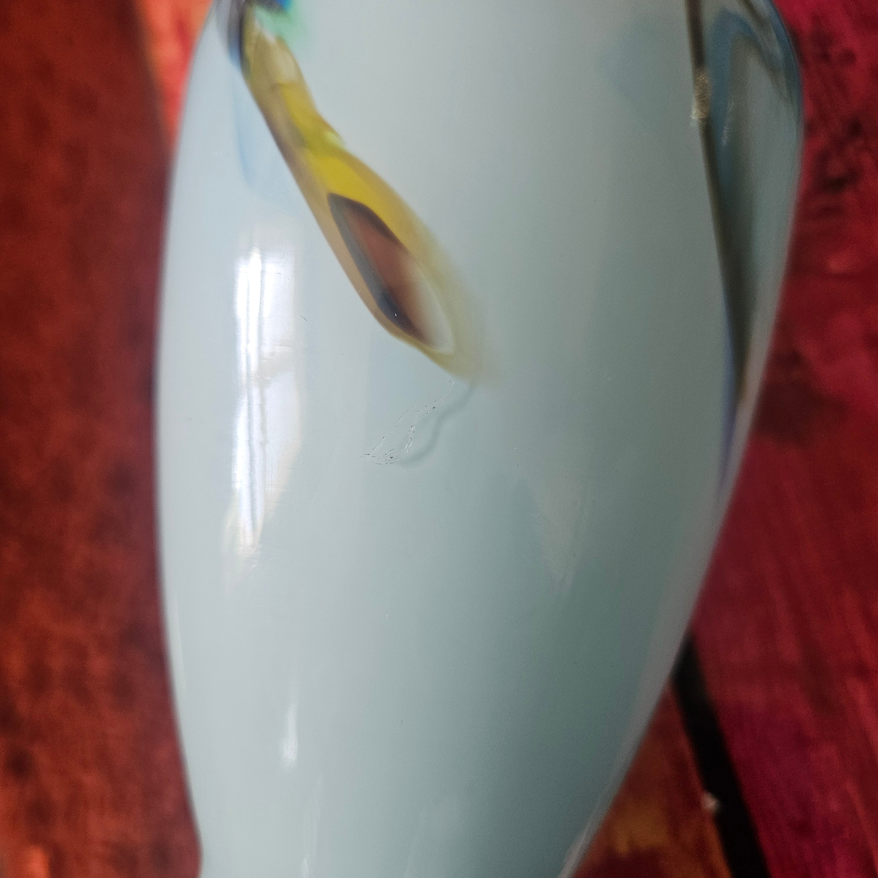 Close up of scratch on Vintage Chinese Studio Art Glass Opaline Cased Vase with Feather Swirl c. 1970s–1990s